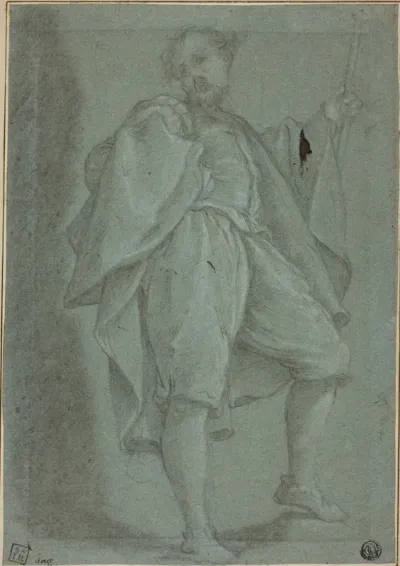 Man Standing with Staff