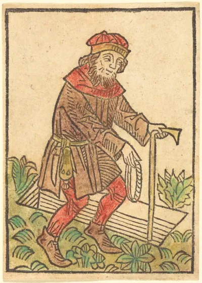 Man Walking Towards a Grave