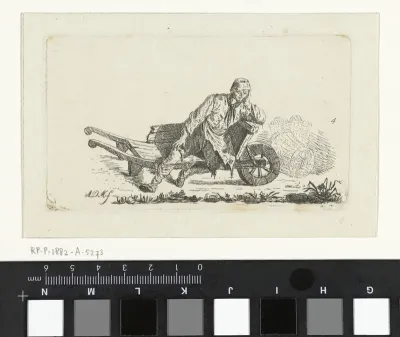 Man zittend in een kruiwagen