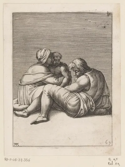 Man zittend op de grond met vrouw en kind