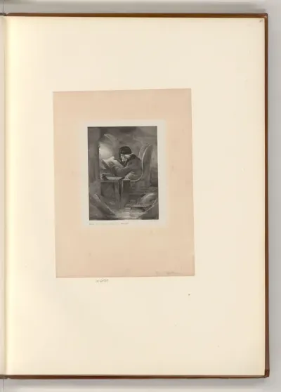 Mann in einem Sessel vor einem Buch