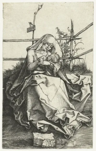 Maria met kind aan de borst bij een hek