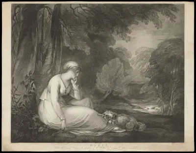 Maria sits sadly under a tree with her dog