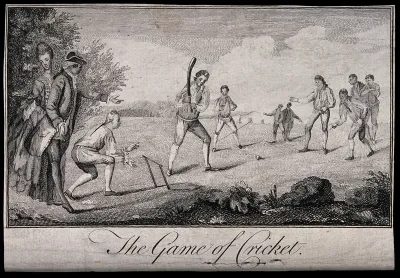 Men playing cricket