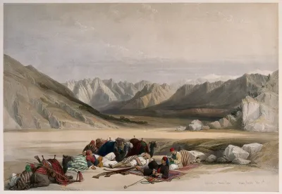 Men resting their camels and smoking by the approach to Mount Sinai