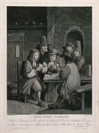 Men sitting around a table playing a game of cards