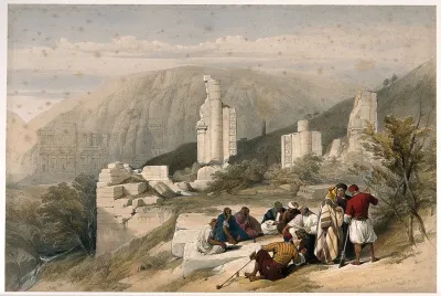 Men sitting to smoke by a ruined triumphal arch at Petra, Jordan