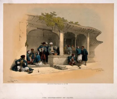 Men smoking and drinking outside a coffee shop in Cairo