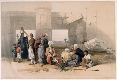 Men talking and smoking by the ruined Temple of Amun at Thebes