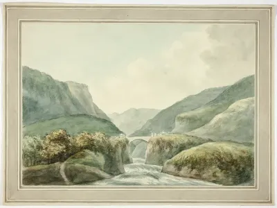 Mountain Town by Bridge Spanning Rapids
