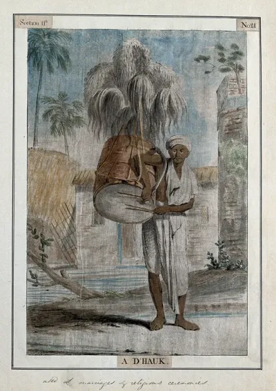 Musician with a d'hauk, a large drum carried over the shoulder and decorated with feathers, played at marriages and religious occasions, Calcutta, West Bengal