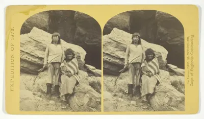 Navajo Brave and his Mother. The Navajo were formerly a warlike tribe until subdued by U.S. Troops, in 1859-60. Many of them now have fine flocks, and herds of horses, sheeps and goats, No. 29 from the series "Geographical Explorations and Surveys We
