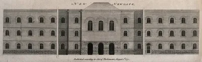 Newgate Gaol in the City of London: a long building with arches at the entrance and many windows