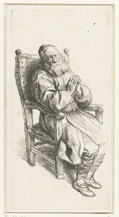 Oude man in een leunstoel