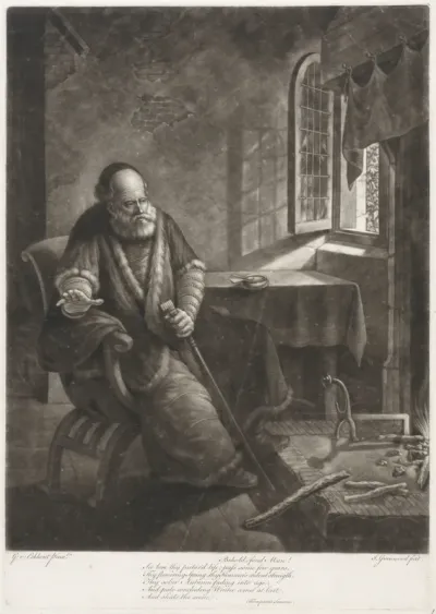 Oude man voor de haard
