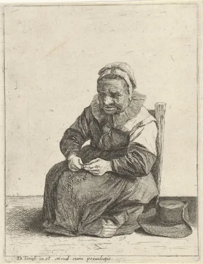 Oude vrouw met een rozenkrans