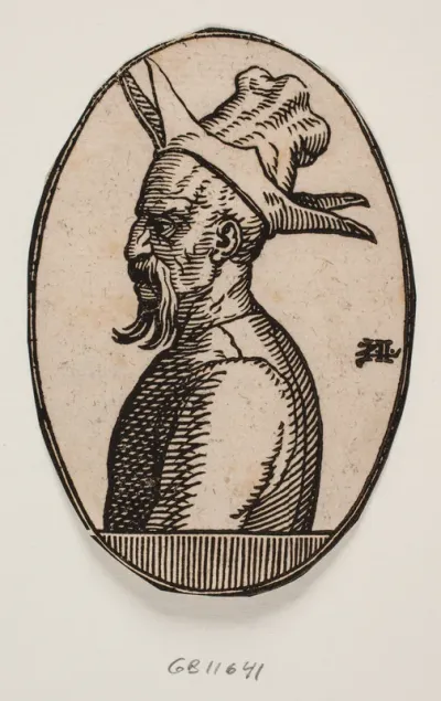 Oval medaljon med brystbillede af mand med hængende moustache og hat med fire flapper