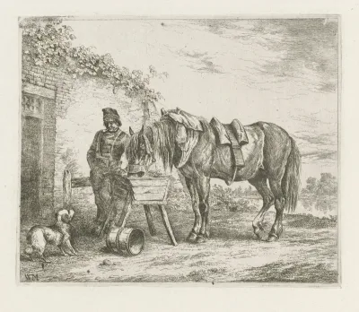 Paard bij een voederbak