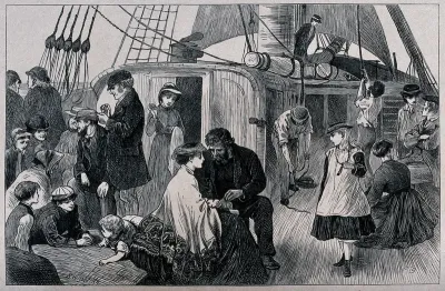 Passengers gathered on the deck of a ship in families