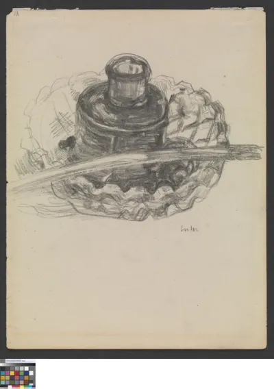 Pen and inkpot on a glass dish