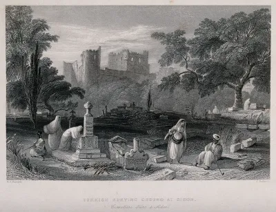 People tending to the graves at a Turkish burying ground at Sidon