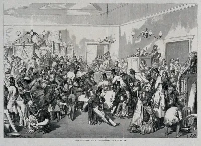 People viewing items at an art auction