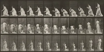 Plate Number 253. Kneeling; elbows on chair and hands clasped