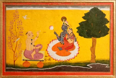 Poet Jayadeva is worshipping Radha and Krishna