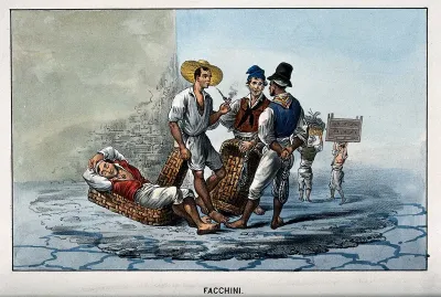 Porters are standing around talking, leaning on baskets; one is asleep; others in the background are carrying items
