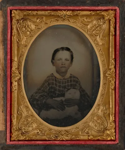 Portrait of a Child and Cat