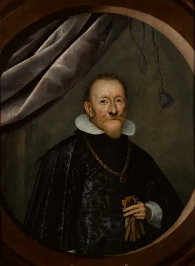 Portrait of a gentleman, half-length, wearing a gold chain