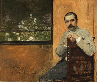 Portrait of a man seated by a window