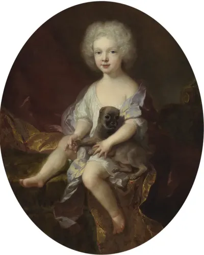 Portrait of a young boy with a dog