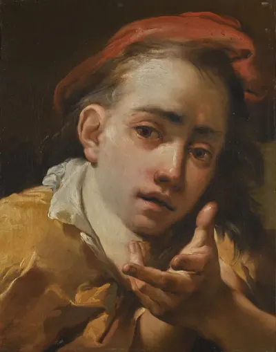 Portrait of a young man, bust-length, wearing a red cap and gesturing to the viewer