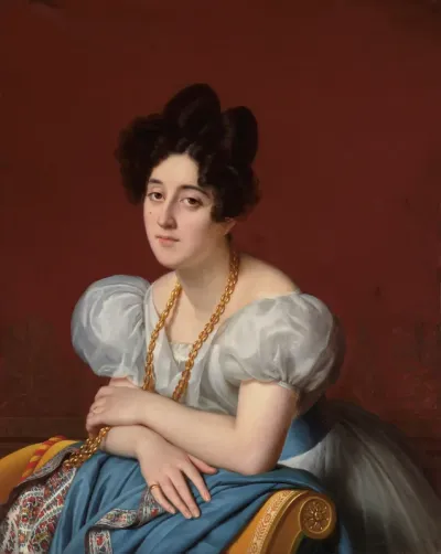 Portrait of a young woman leaning on a meridienne