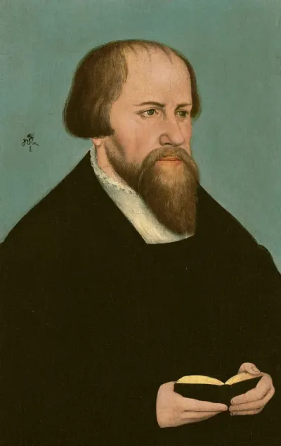 Portrait of Caspar Cruciger (1504-1548), bust-length, holding a book