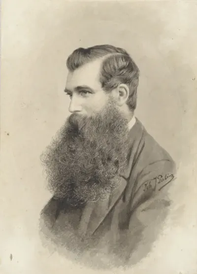 Portret van een man met baard, naar links