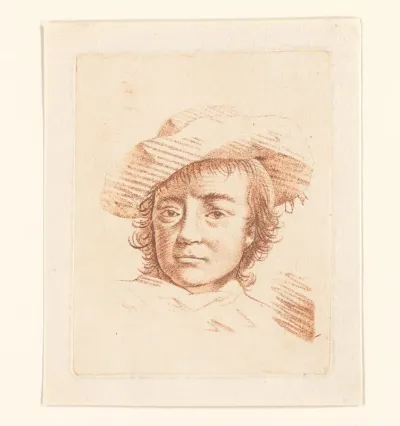 Portret van een onbekende jongen met hoed