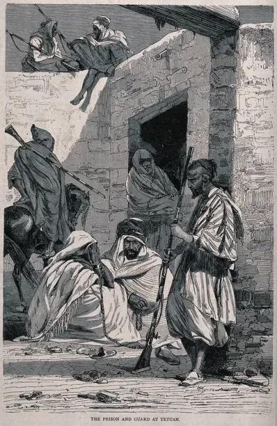 Prisoners at Tétouan restrained by chains seated in the presence of four guards armed with rifles