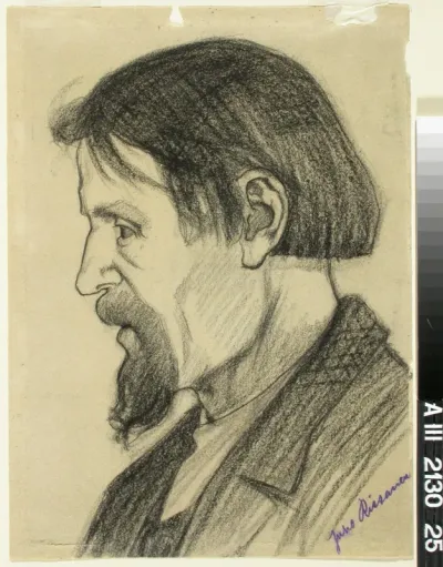 Profilbild av en skäggig man