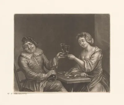 Proostende man en vrouw aan tafel