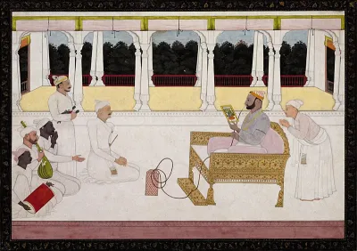 Raja Balwant Singh of Jasrota examining a painting with Nainsukh
