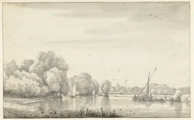 Rivier tussen bomen en weiden