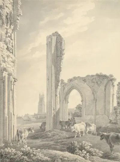 Ruïne van Glastonbury Abbey met de toren van St. John op de achtergrond