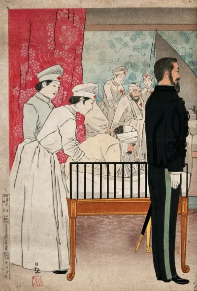 Russo-Japanese War: Red Cross nurses attending war casualties in a Japanese hospital; right, a European (?) man in formal military dress is standing to attention and facing right