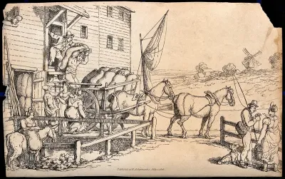 Sacks of flour are being loaded onto a cart from a miller's storehouse