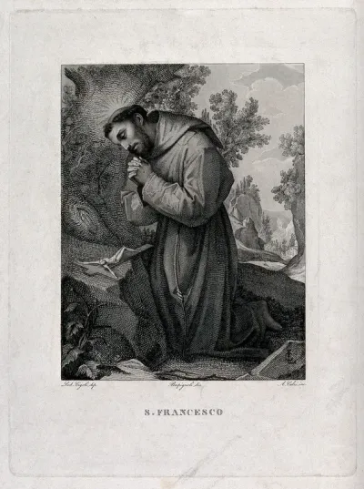 Saint Francis of Assisi in the wilderness; kneeling in front of a crucifix