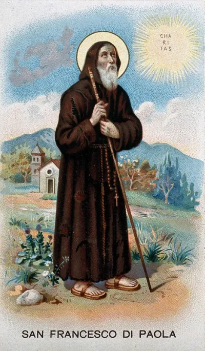Saint Francis of Paula holding his walking stick and looking at the sun; church and mountains in the background