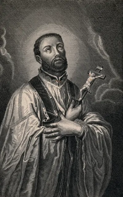 Saint Francis Xavier, holding a crucifix, looking upwards