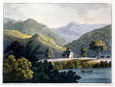 São Fidélis, Brazil: the mission church with houses on the Rio Paraíba, with wooded mountains behind